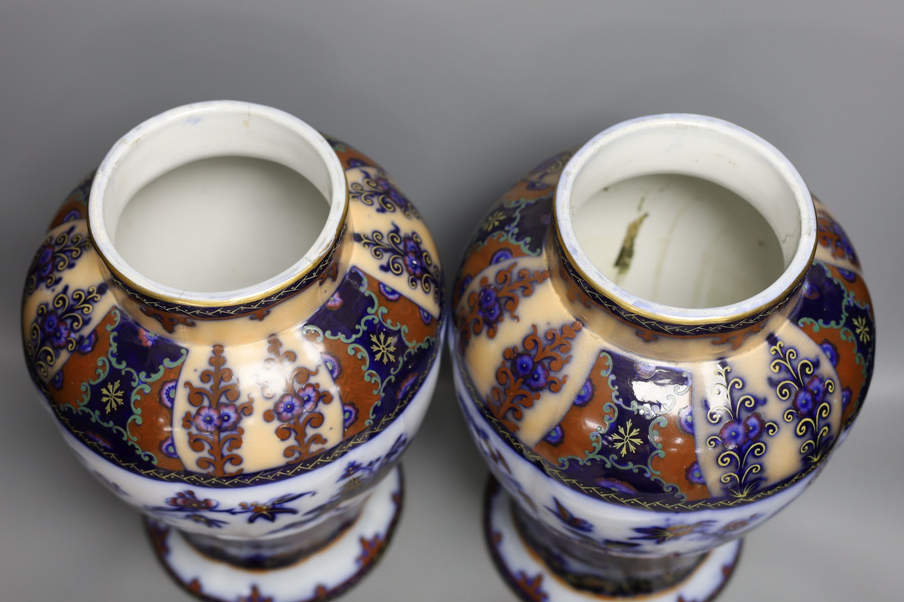 A pair of mid 19th century ironstone vases and covers - 51cm tall